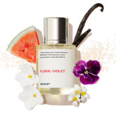 Dossier Floral Violet bottle on a soft rose background, suggesting everyday elegance.