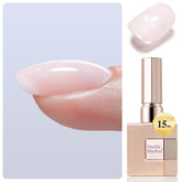 Double Rhythm nail strengthener bottle in nude pink for durable, long-wearing nails.