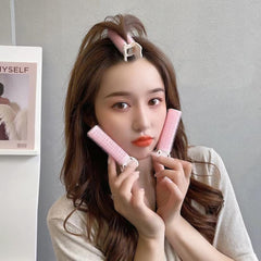 Douqu heat-free rollers preserve hair while shaping curls and waves.