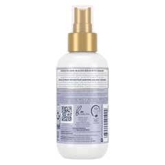 Dove Hair Therapy Leave-In Spray Dispense showing quick, convenient styling support.
