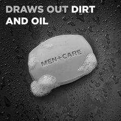 Dove Men+Care charcoal bar in shower with rich lather.