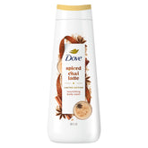 Dove Spiced Chai Latte Body Wash bottle on shelf, nourishing skin is suggested.