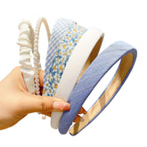 DOXISHRUKY pearl floral padded headband blue for a polished everyday look