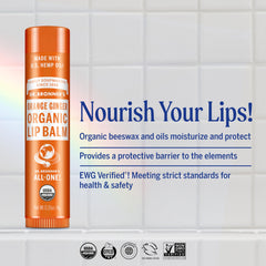 dr bronners lip balm orange ginger tube close-up shows smooth texture
