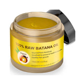 Dr. Sebi Batana Oil vertido en la botella para cabello suave