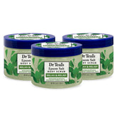 Dr Teal's exfoliante corporal con sales de Epsom, frasco derramando para relajación.