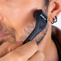 Dremenester Derma Roller on scalp to support healthier-looking hair