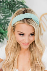 DRESHOW knotted headbands keep hair in place during workouts