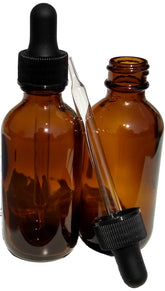 Dropper Stop 2oz amber glass bottle with dropper protects essential oils from UV light.