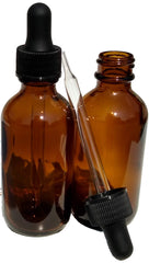 Dropper Stop 2oz amber glass bottle with dropper protects essential oils from UV light.