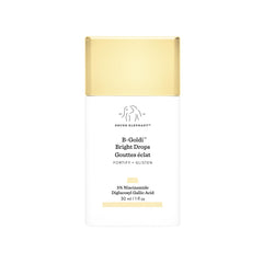 Drunk Elephant B-Goldi Bright Drops bottle-pour reveals a luminous golden finish for even tone.