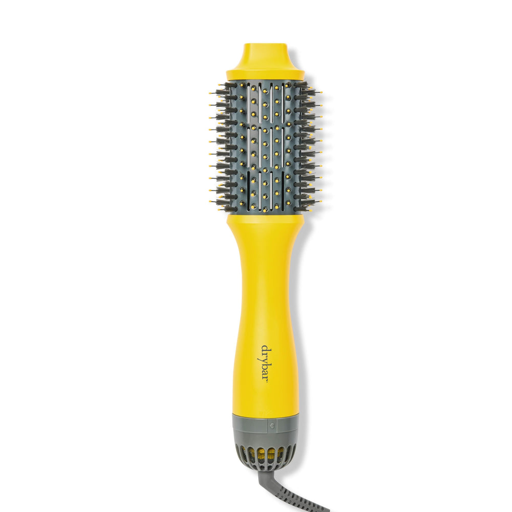 Drybar Double Shot oval blow-dryer brush in compact design for quick styling.