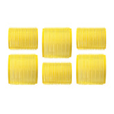 Drybar High Tops Self-Grip Rollers lift the crown for added volume.