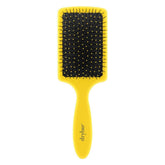 Drybar Lemon Bar Paddle Brush front view with a comfortable grip for steady styling.