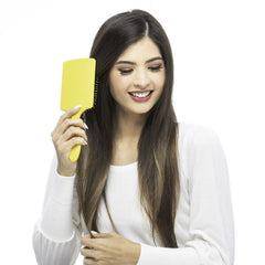 Drybar Lemon Bar Paddle Brush wide base delivers broader coverage for faster smoothing.