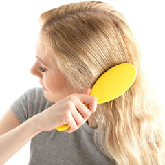 Drybar Super Lemon Drop detangling brush soft-touch finish for comfortable grip