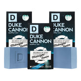 Duke Cannon Midnight Swim soap bar close-up showing a rich lather for daily cleansing.