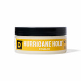 Duke Cannon Hurricane Hold Pomade envase de dos onzas con acabado mate y agarre duradero.