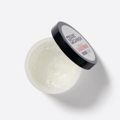 Duke Cannon News Anchor Pomade bottle highlighting strong hold with natural finish.