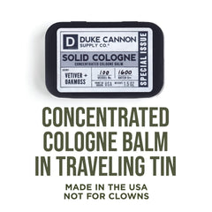 Duke Cannon solid cologne tin open for quick access on the go.