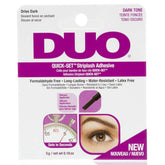 DUO Quick-Set bottle with brush for precise lash glue application.