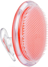 Dylonic exfoliating brush on the face for smooth pre-shave prep.