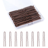 Dysalic U-shaped hair pins in brown in a compact storage box for easy organization.