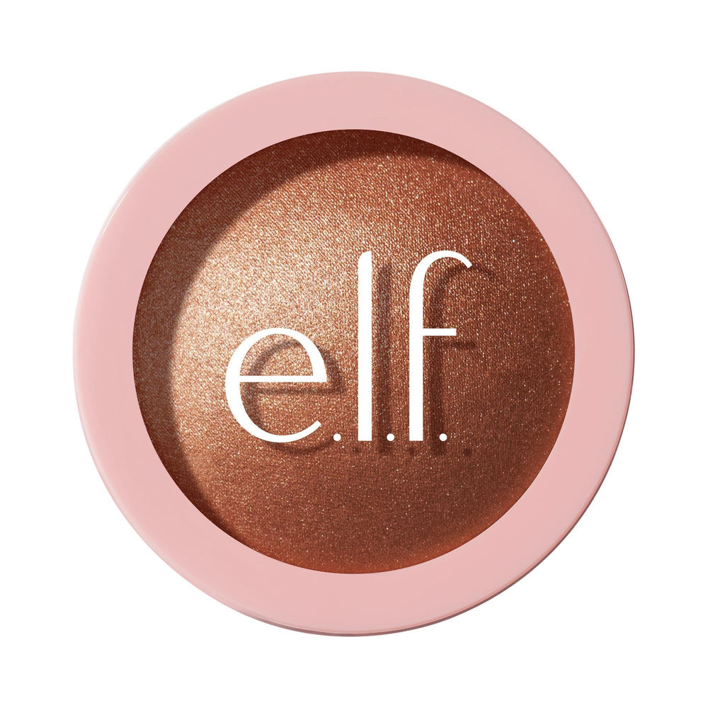 Halo Glow Coppertunist iluminador en polvo realza pómulos con brillo duradero.