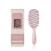 Ecoed Detangler Hairbrush pink vented design promotes quick drying and smooth detangling.