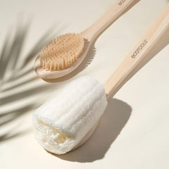 EcoTools Bath Bristle Brush used with body wash for full-body cleanse