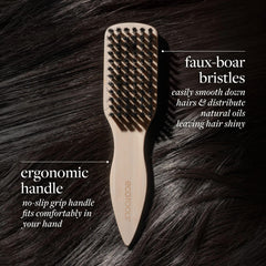 EcoTools Mini Slick Back Brush head close-up shows dense boar bristles for flyaway control.