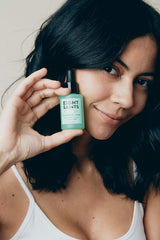 Eight Saints Hyaluronic Serum applied to cheek for plump, smooth appearance