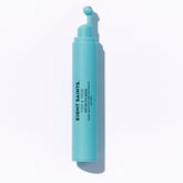 Eight Saints Tide & True Eye Serum bottle close-up, lightweight de-puffing formula.