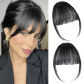 ELEFOCUS clip-in bangs close-up shows natural black hair for a seamless blend.