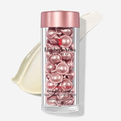 Closeup of Elizabeth Arden Retinol + HPR Ceramide Capsules ready for daily use.