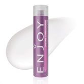 Enjoy Luxury Conditioner bottle pour shows easy dispensing for frizz control and moisture.