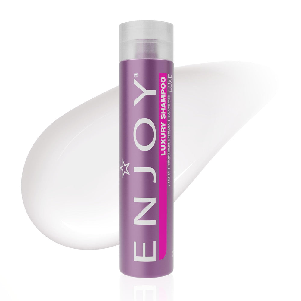 Enjoy Luxury Shampoo bottle demonstrates frizz-control for sleek, manageable hair.