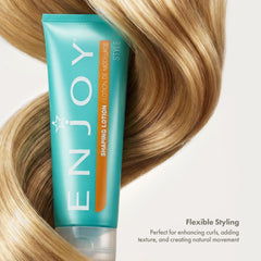 Close-up of hair shine with Enjoy Shaping Curly Hair Styling Cream on curls.