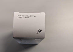 Epionce Daily Shield tinted SPF 50 swatch on skin showing tint