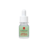 Erborian Centella Red Serum: botella elegante para cuidado diario y calmante de irritaciones.