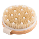 Essential Aura dry body brush with natural bristles for gentle exfoliation and smoother skin.