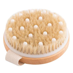 Essential Aura dry body brush with natural bristles for gentle exfoliation and smoother skin.