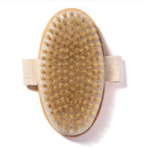 Essential Aura dry body brush with wooden handle provides gentle exfoliation.