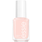 essie Skinny Dip bottle closeup showcasing a glossy peach shade for salon-like nails.