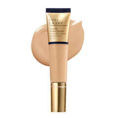 Estée Lauder Futurist Hydra Rescue foundation bottle close-up for radiant, glowing skin.