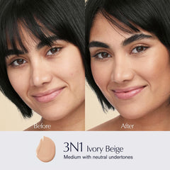 Close-up of fingers applying Estée Lauder Futurist foundation for natural coverage.