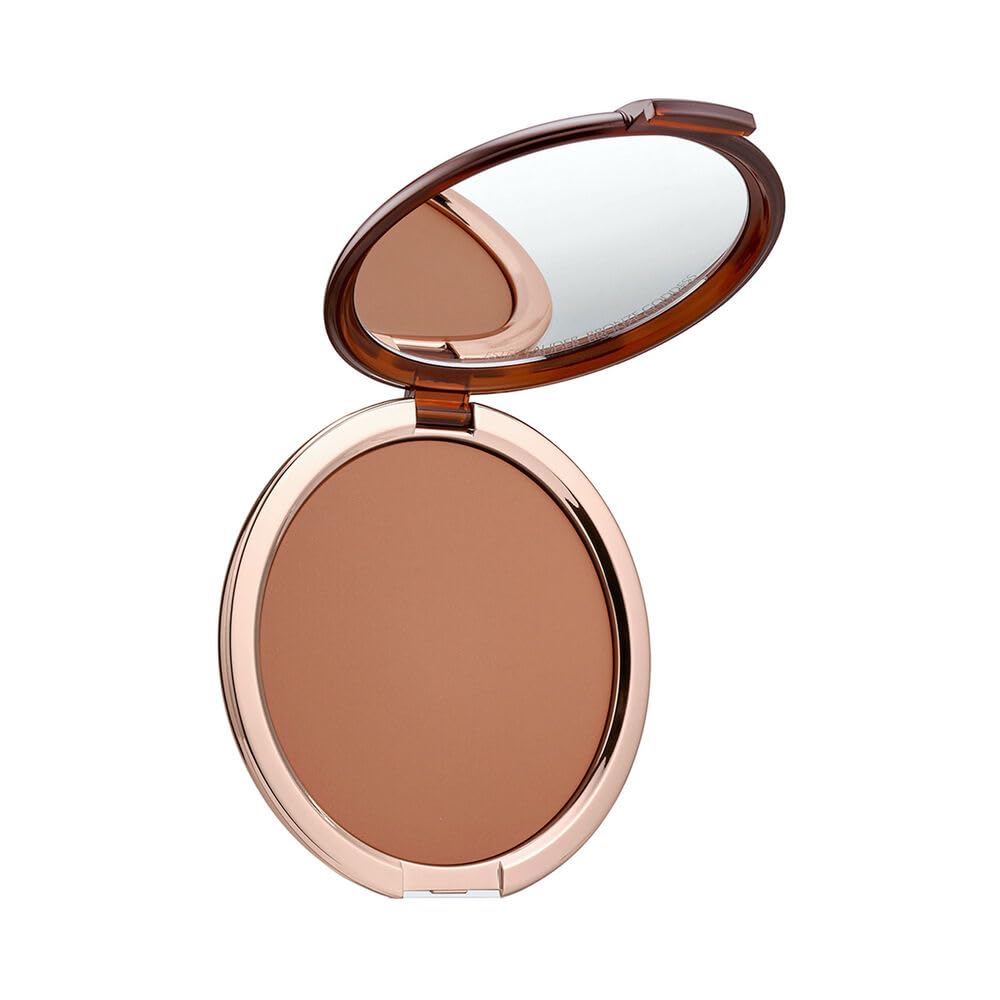 Estee Lauder Bronze Goddess bronzer on face for sun-kissed glow