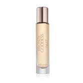 Estee Lauder Bronze Goddess Nuit bottle close-up highlights amber floral glow for evening allure