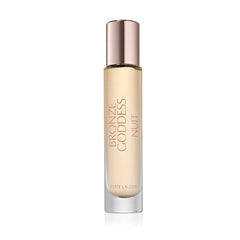 Estee Lauder Bronze Goddess Nuit bottle close-up highlights amber floral glow for evening allure