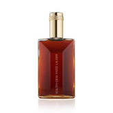 Estée Lauder Youth-Dew bath oil bottle close-up highlighting fragrance.